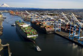 A tug pulling a big ship
